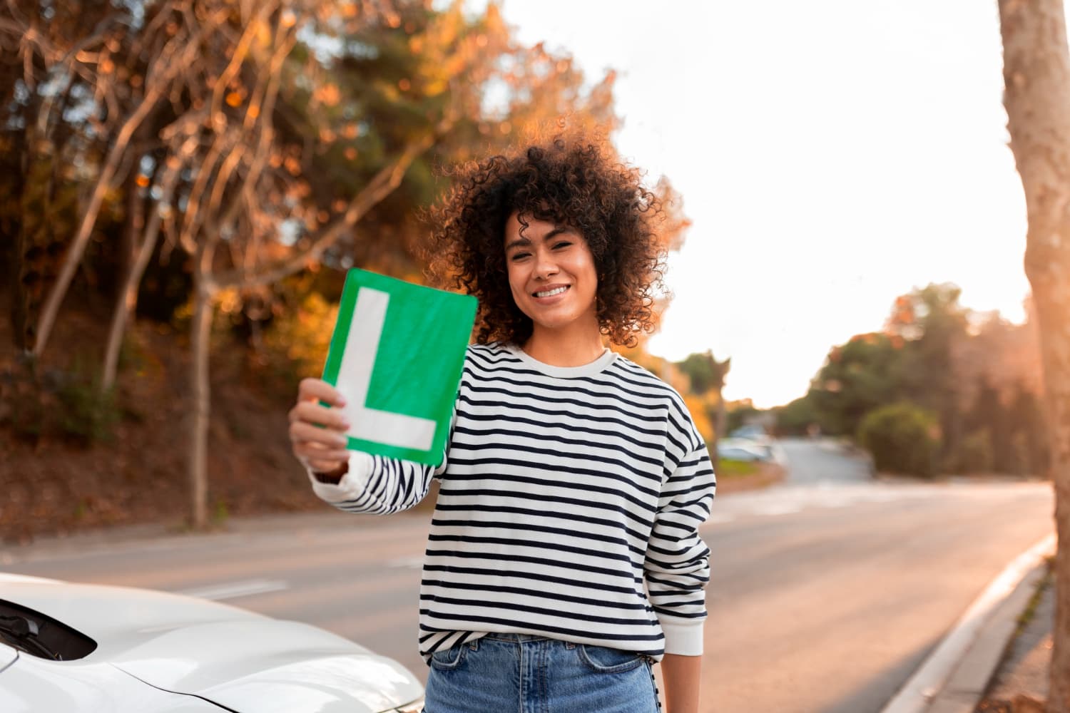 Happy woman driving in Spain